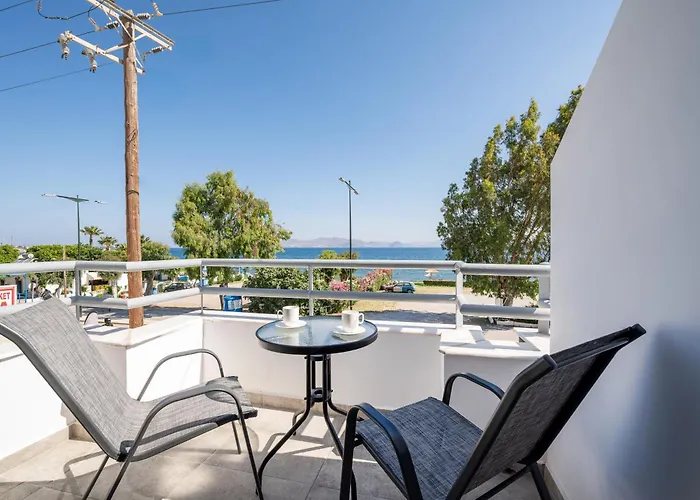 شقة Kos Mare - Elegant Beachfront Stay بلدة كوس