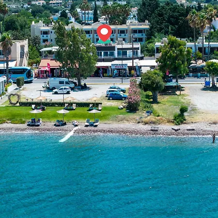 Апартаменты Kos Mare - Elegant Beachfront Stay Кос